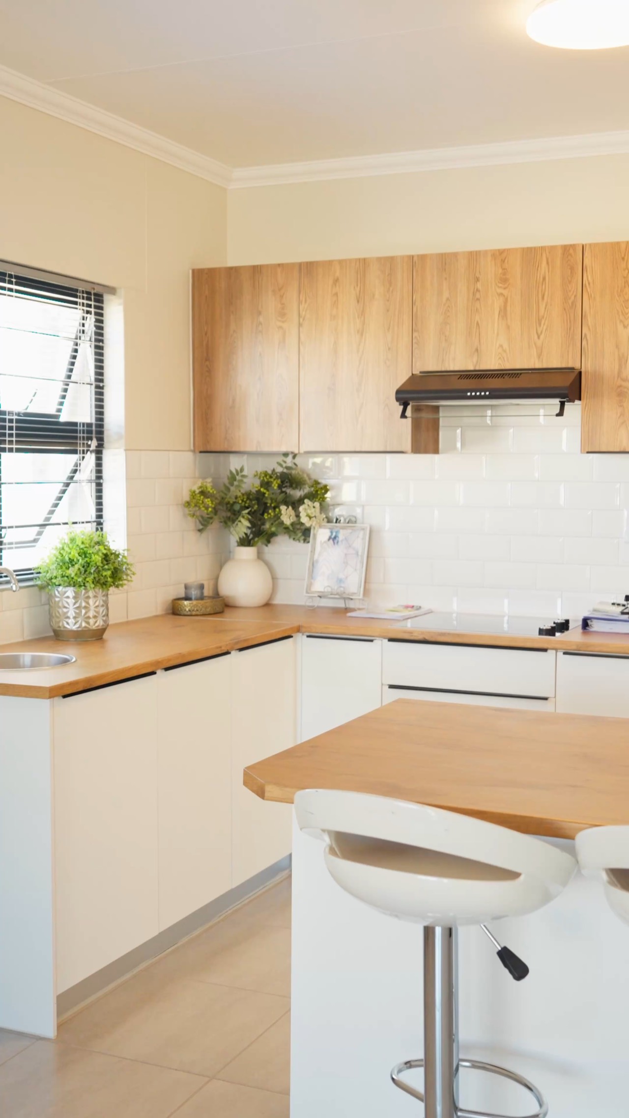 Kitchen of an Okamita Properties show house, with a window over the counter